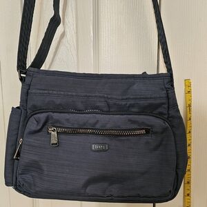 LUG Infinaty Shimmy Crossbody Bag